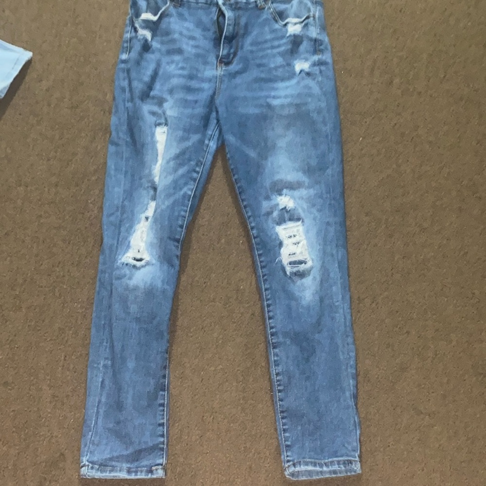 Dark blue rips but has the jeans under